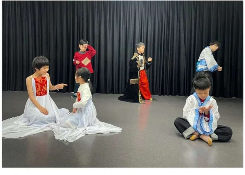 Students performing a myth in costume