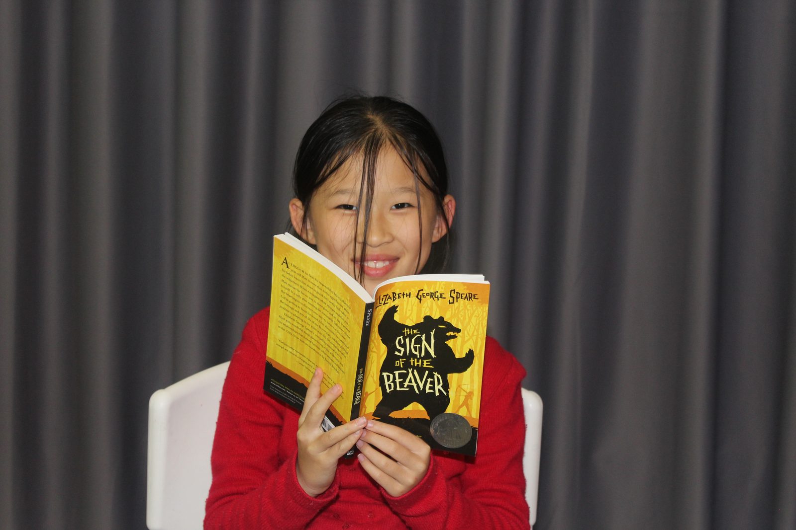 A Kids Canon student reading The Sign of the Beaver