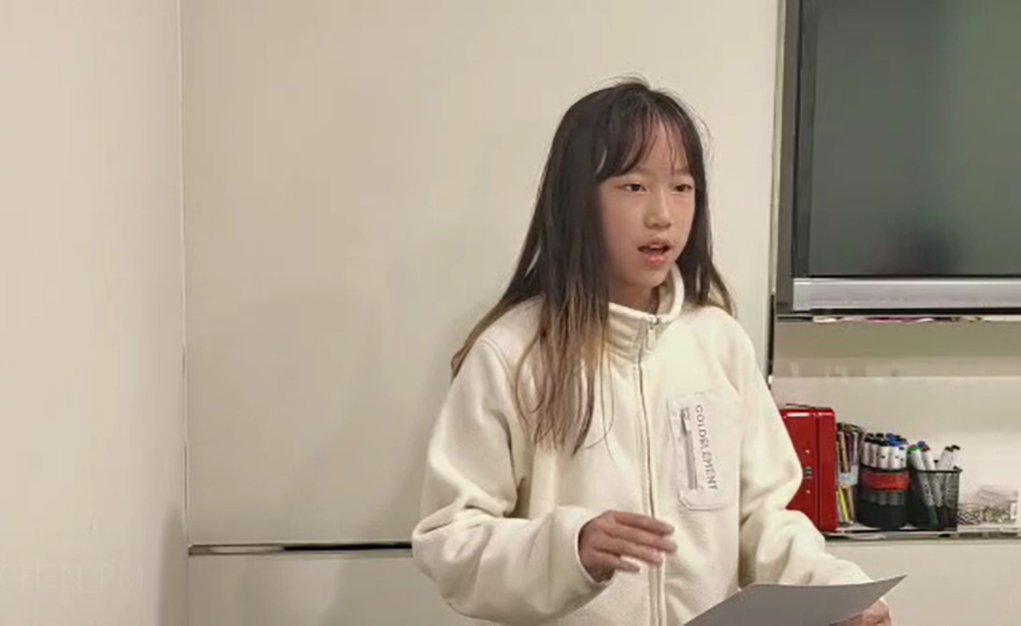A Kids Canon student presenting to the class