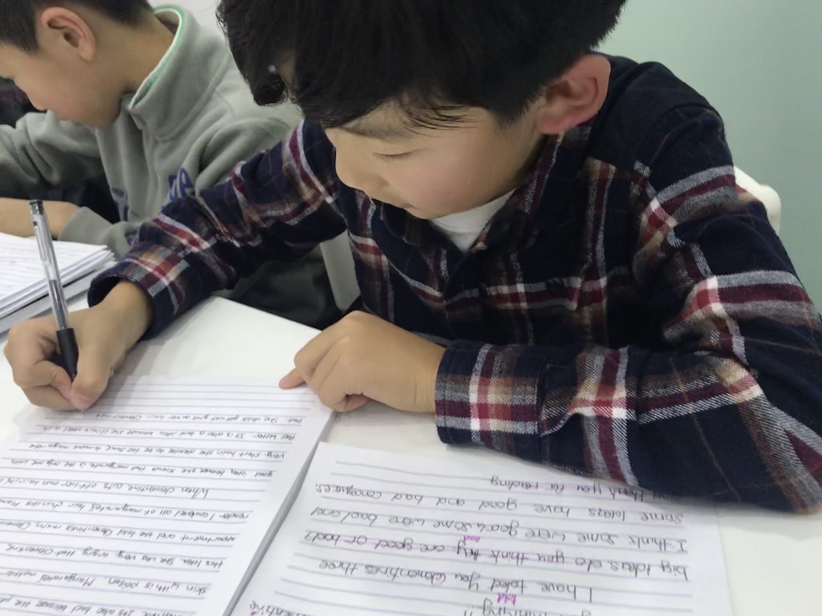 A Kids Canon student writing