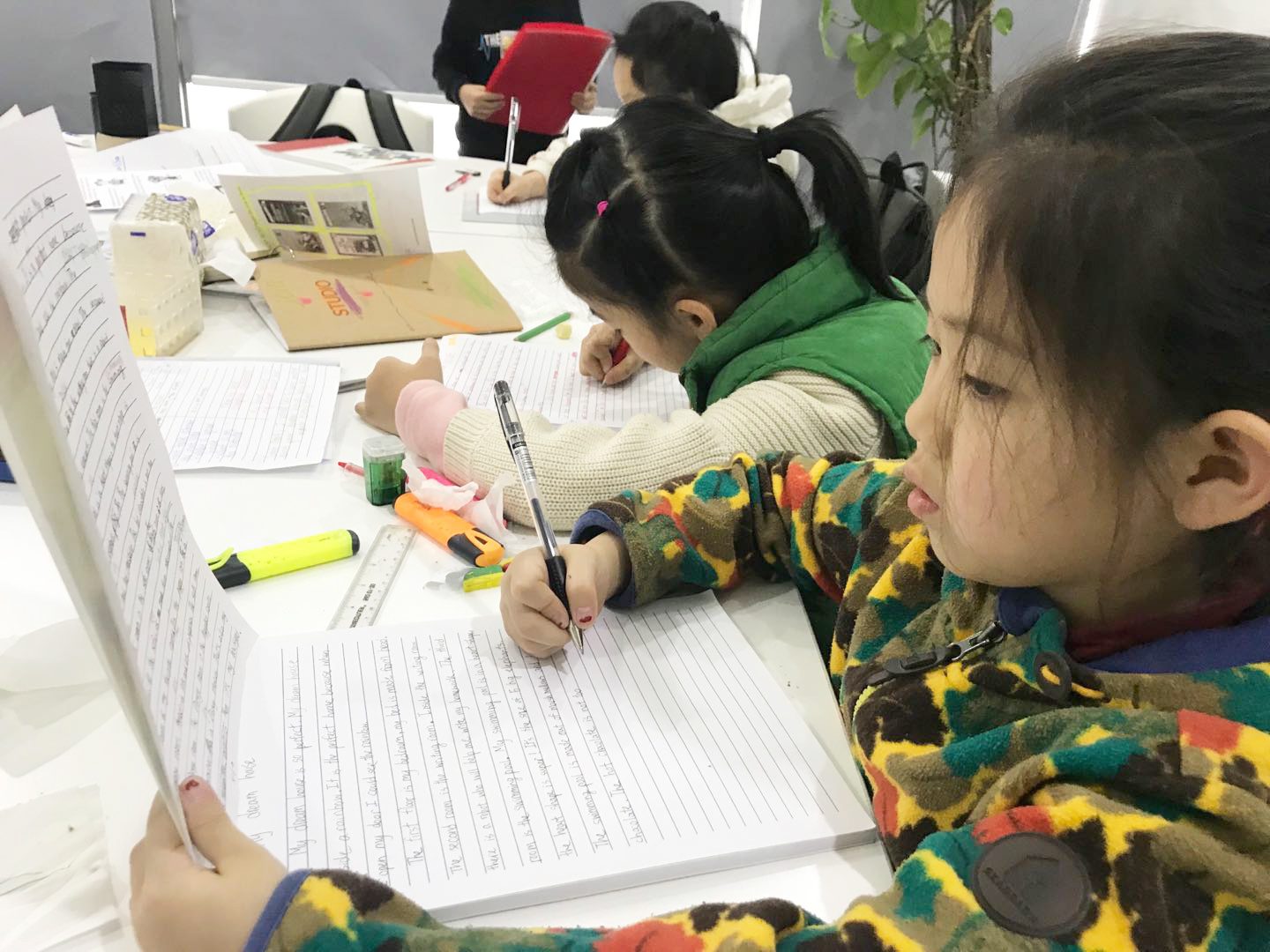 A Primary English student writing